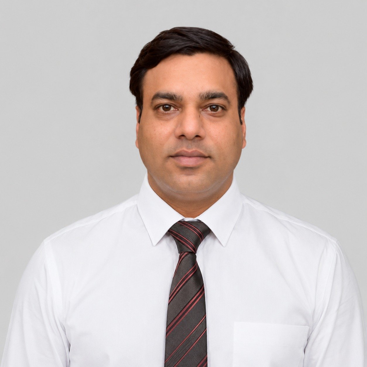 Dr. Dharmender